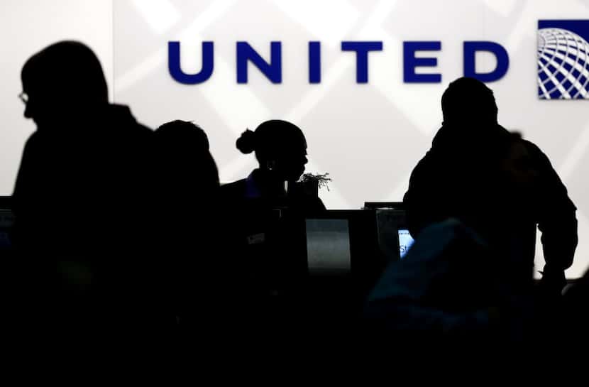United Airlines ticket counter (AP Photo/Nam Y. Huh, File)