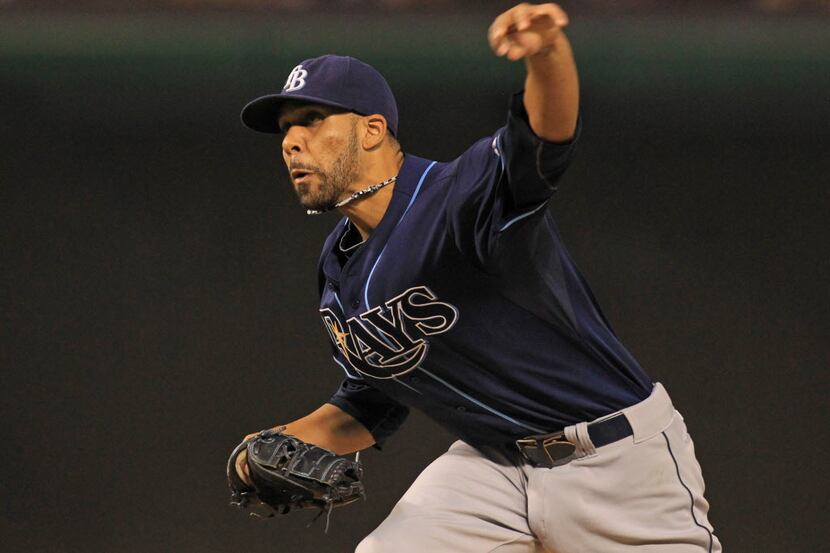 Tampa starting pitcher David Price throws a first-inning pitch during the Tampa Bay Rays vs....