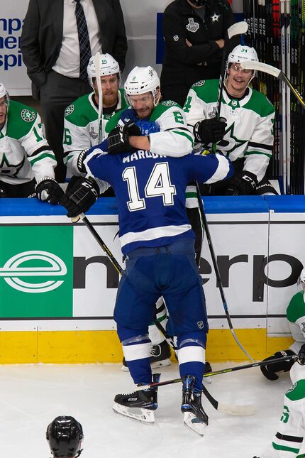 Jamie Oleksiak (2) of the Dallas Stars battles against Pat Maroon (14) of the Tampa Bay...