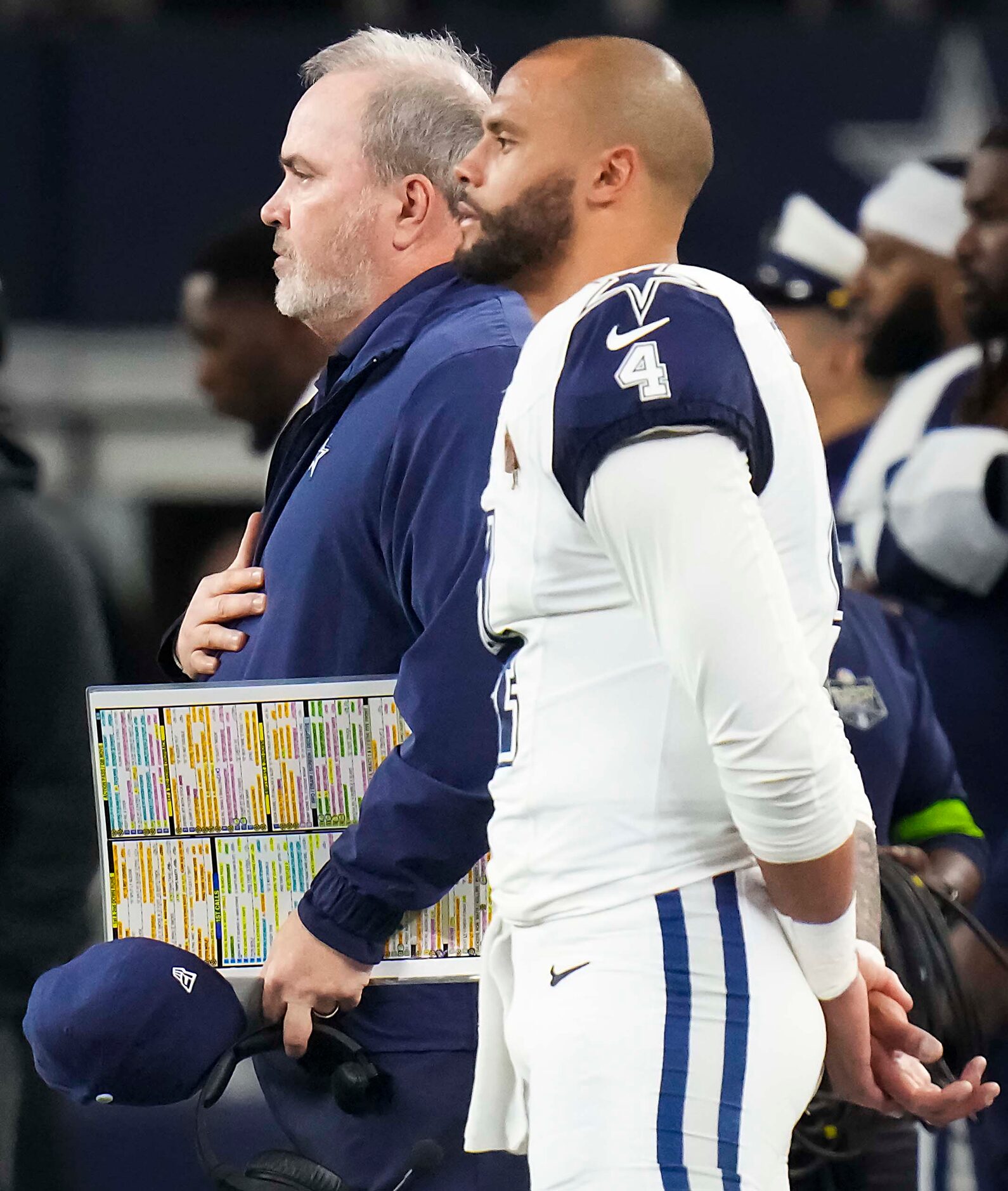 Dallas Cowboys head coach Mike McCarthy and quarterback Dak Prescott (4) stand for the...