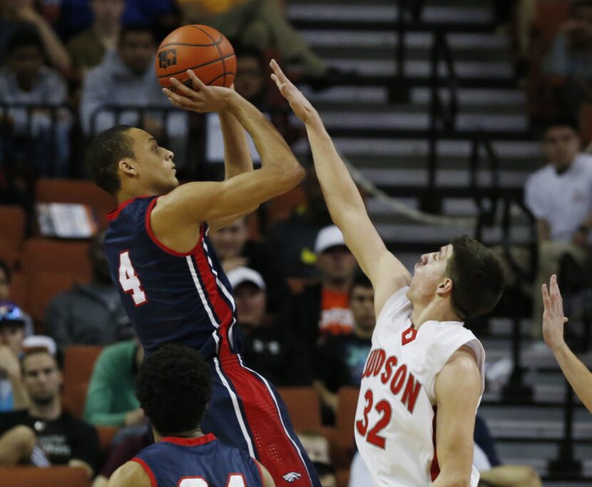 Allen forward Jamuni McNeace (4) takes a shot as  Converse Judson w Tanner Leissner (32)...