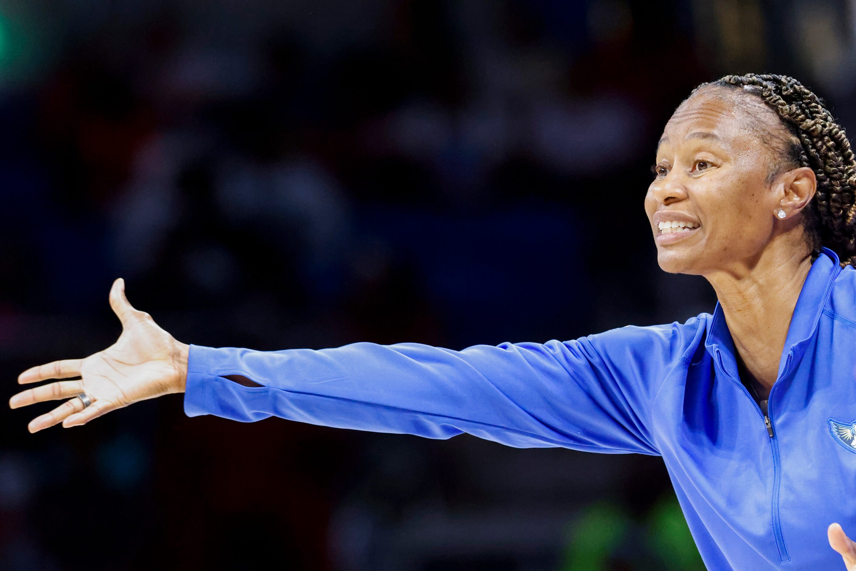 Dallas Wings head coach Vickie Johnson instructs during the second half of a WNBA basketball...