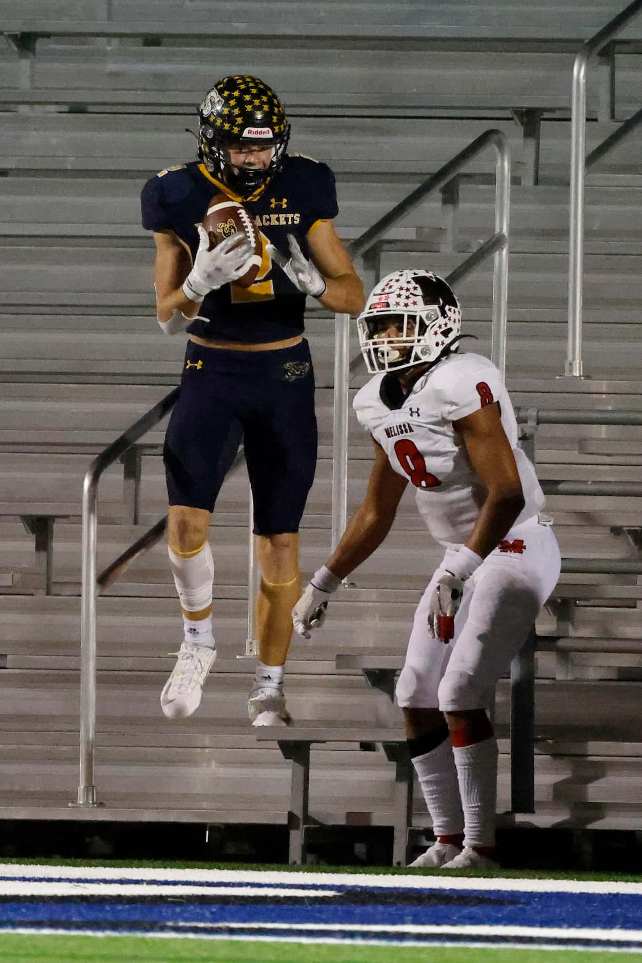 Stephenville wide receiver Coy Eakin (2) celebrates his touchdown reception in front of...