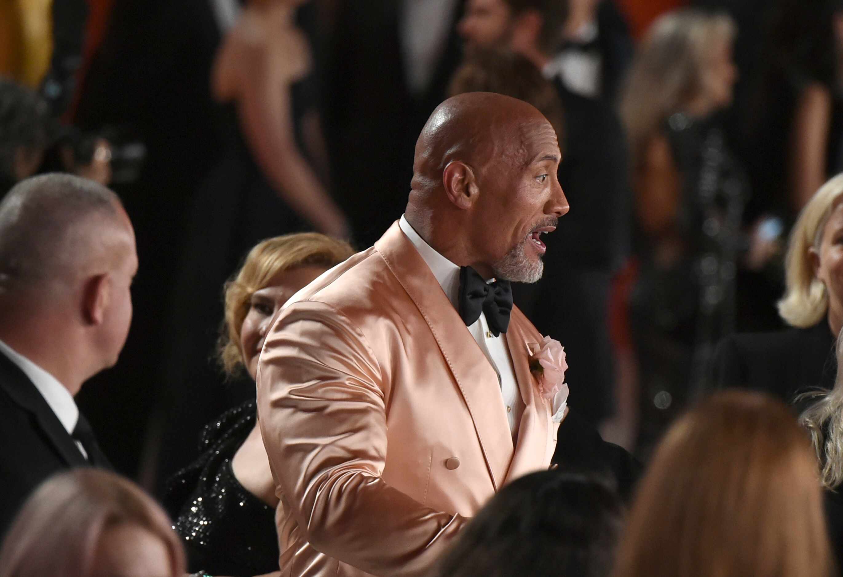 Dwayne Johnson arrives at the Oscars on Sunday, March 12, 2023, at the Dolby Theatre in Los...