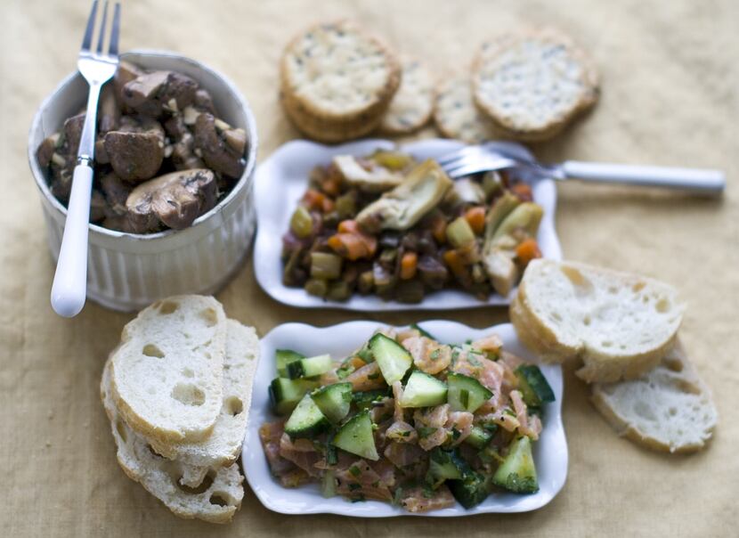 From left clockwise: balsamic marinated mushrooms, artichoke caponata and smoked salmon tartare