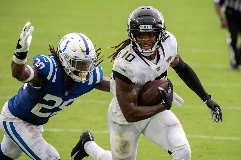 Jacksonville Jaguars wide receiver Laviska Shenault Jr. (10) scores a touchdown in front of...