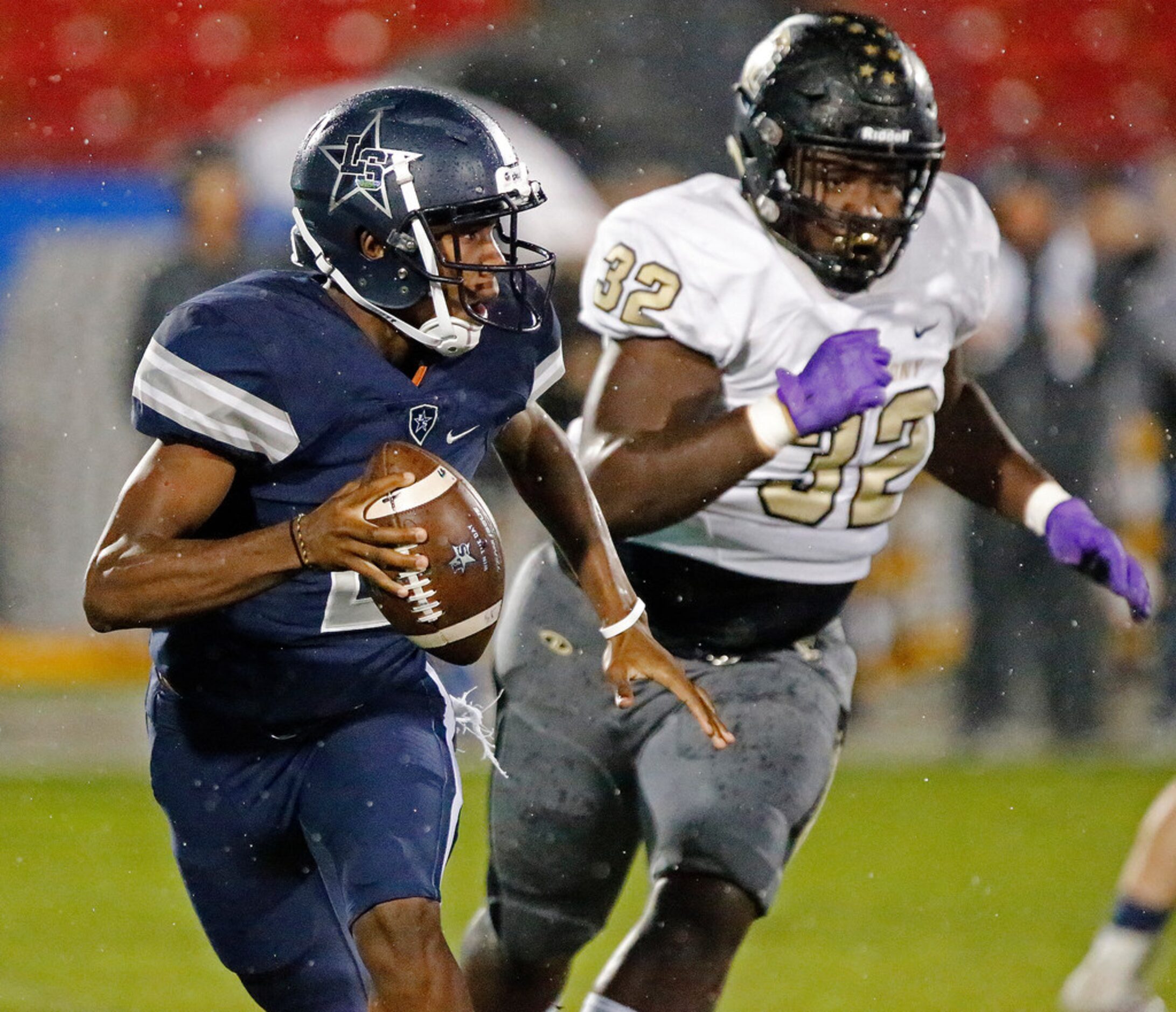 Lone Star High School quarterback Julian Larry (2) eludes The Colony High School defensive...