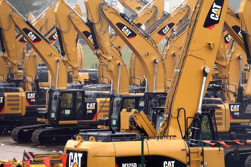 FILE - This Thursday, Feb. 28, 2013, file photo shows a parking lot at Caterpillar Belgium,...