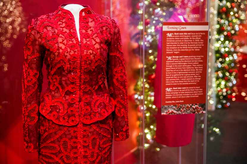 An Oscar de la Renta evening gown worn by Laura Bush was displayed in a Christmas exhibit at...