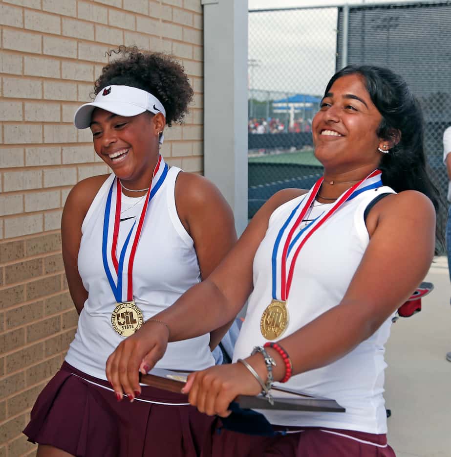 Saundarya Vedula (right) and Tamiya Lintz after they won the 5A girls doubles match at the...