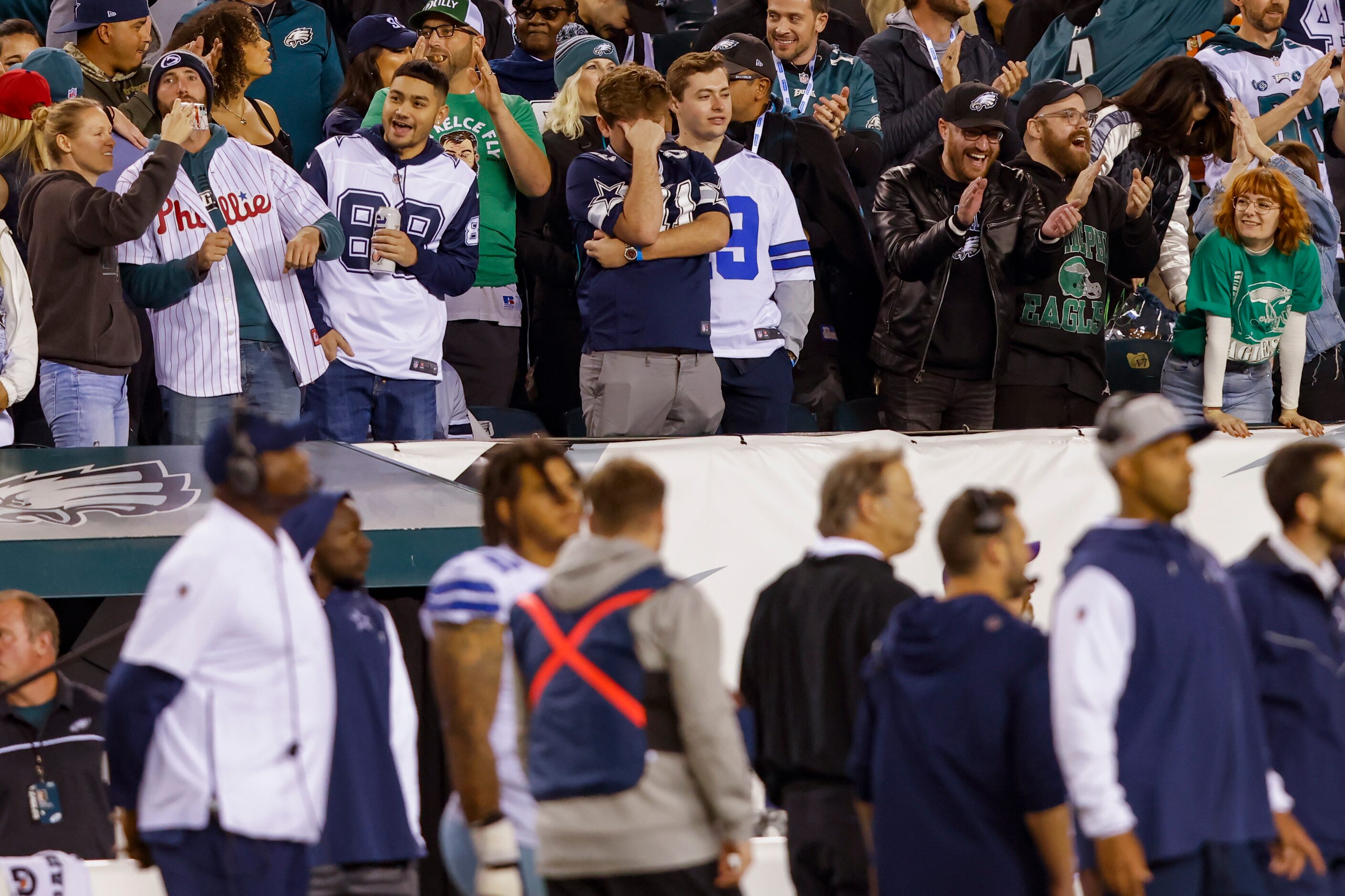 A Dallas Cowboys fan puts his hand on his head during the fourth quarter of a Dallas Cowboys...