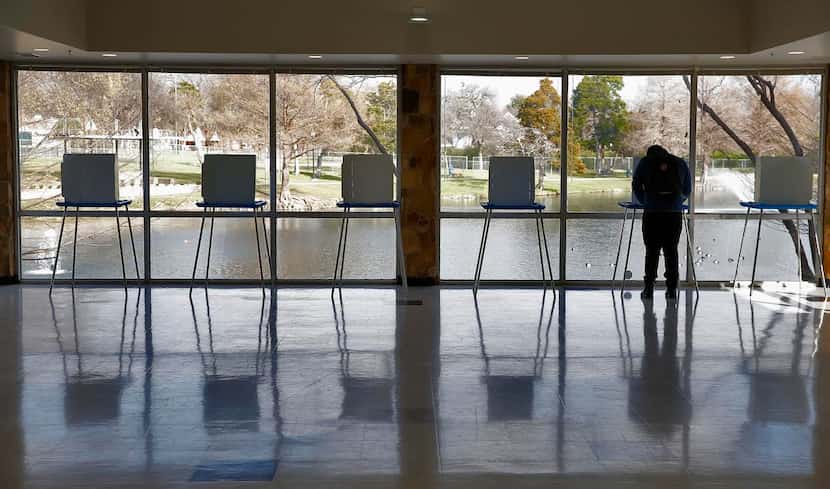  Daniel Laabs voted at Kidd Springs Recreation Center in Dallas. (Nathan Hunsinger/Staff...