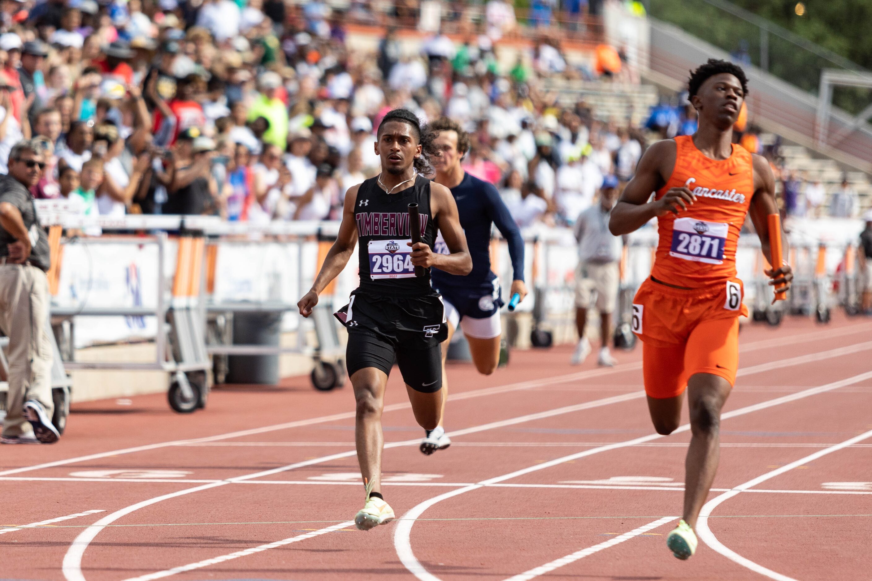 Ethan Moffett of Mansfield Timberview reacts at the finish line after finishing sixth in the...