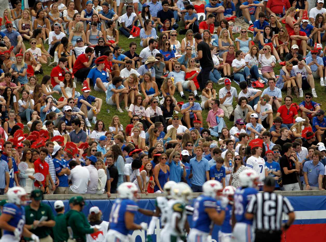 SMU fans fill the grassy hill beyond the south end zone during first half action of the SMU...