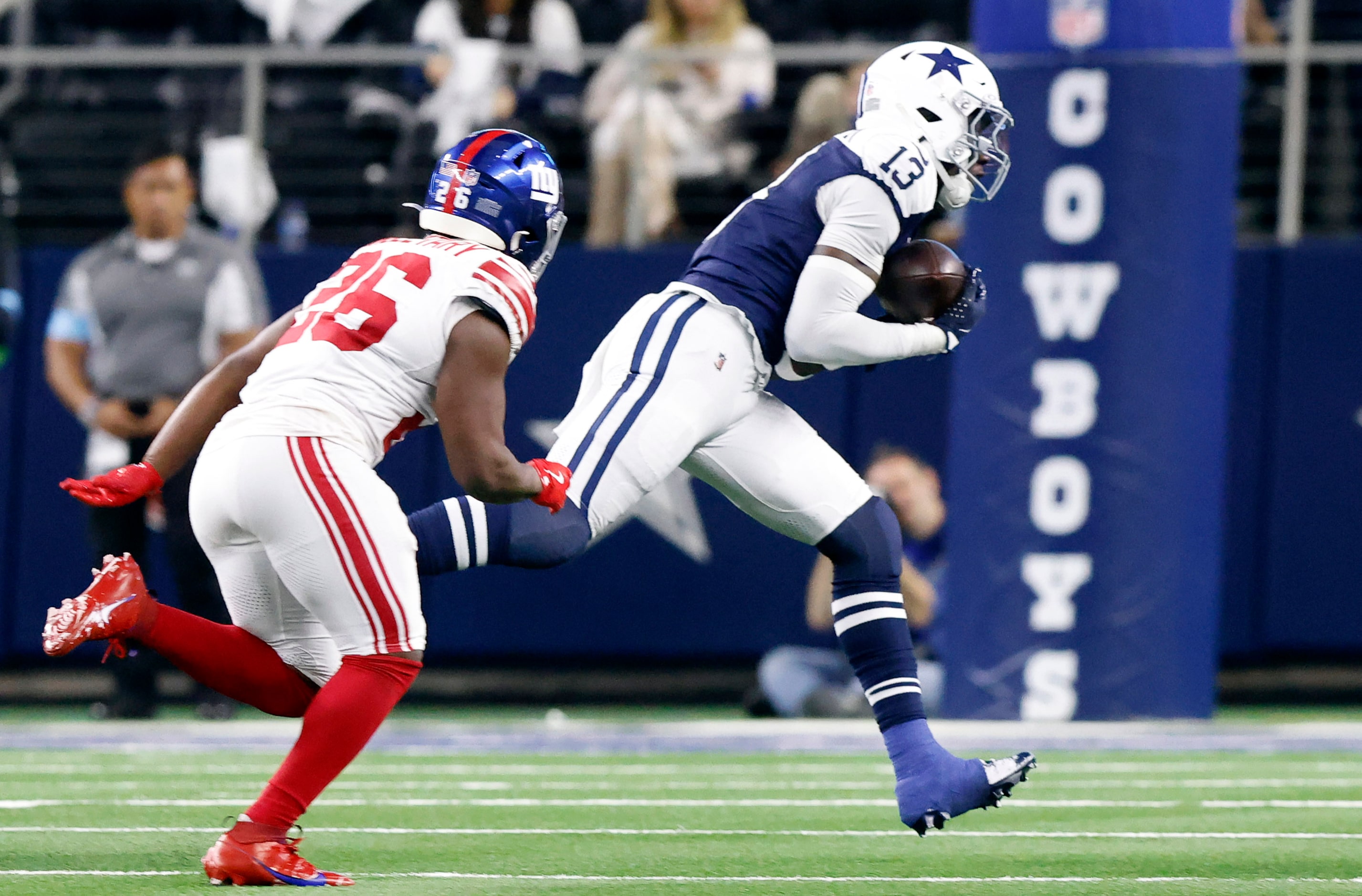 Dallas Cowboys linebacker DeMarvion Overshown (13) catches a tipped pass for an interception...