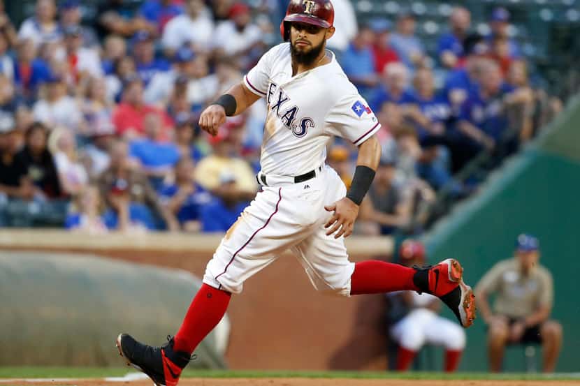 Texas Rangers second baseman Rougned Odor (12) runs to third base in the second inning at...