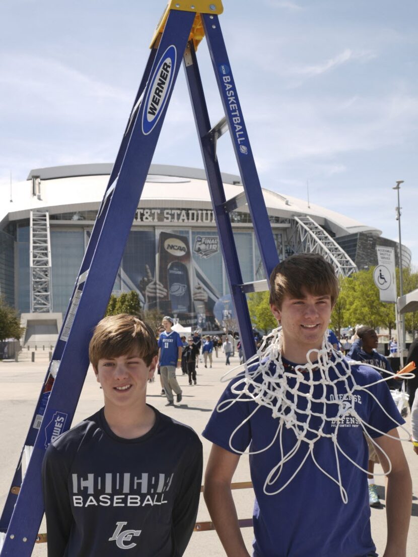 Dylan Penick, 12, and Bryce Penick,15, of Guthrie, Kentucky pose by the Werner Ladder Friday...