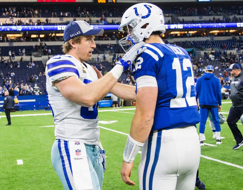 Dallas Cowboys outside linebacker Sean Lee (50) greets Indianapolis Colts quarterback Andrew...