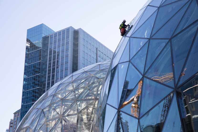 Large spheres in front of Amazon's building in Seattle. , Amazon said in October it had...