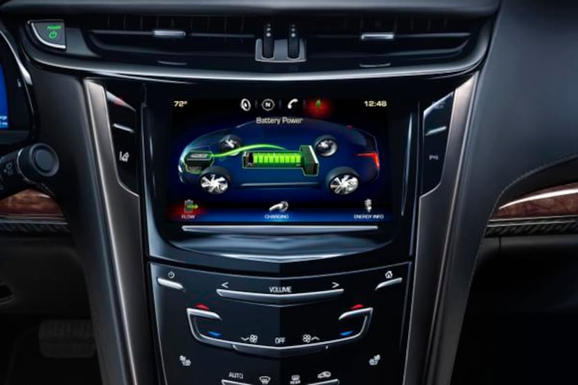 
The large center stack has an eight-inch touch screen and Cadillac’s controversial CUE...