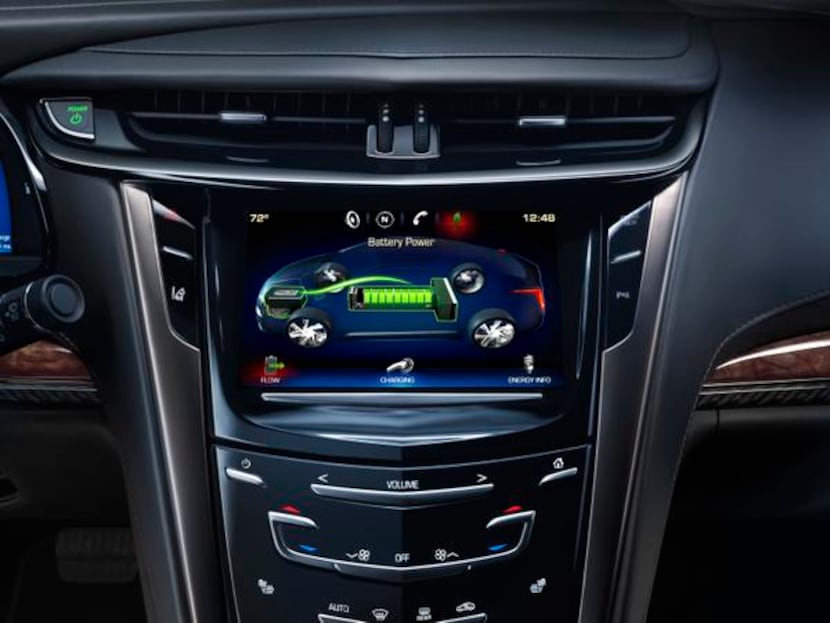 
The large center stack has an eight-inch touch screen and Cadillac’s controversial CUE...