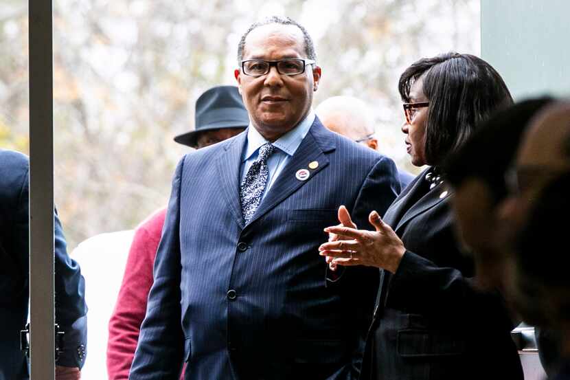 Dallas City Council member Kevin Felder, center, arrives for a Dallas City Council meeting...