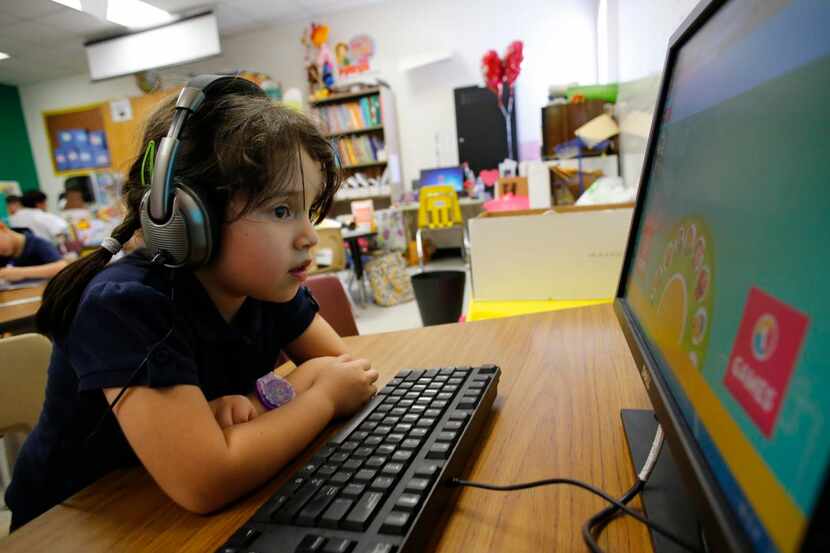 
Sophia Chavez works with a website during a full-day pre-k class at Cesar Chavez Learning...