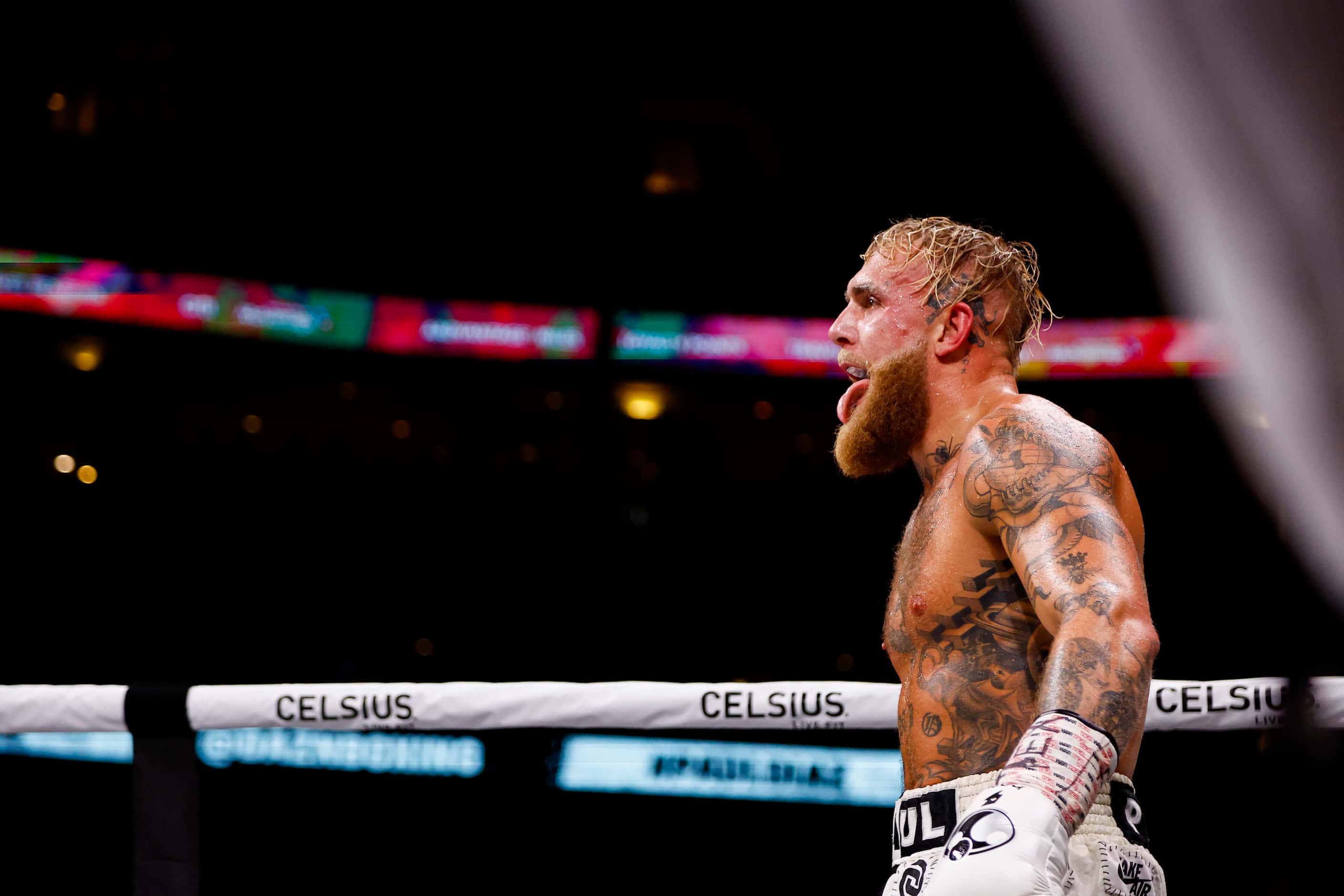 Jake Paul taunts Nate Diaz, not pictured, during a boxing match in Dallas, Saturday, August...