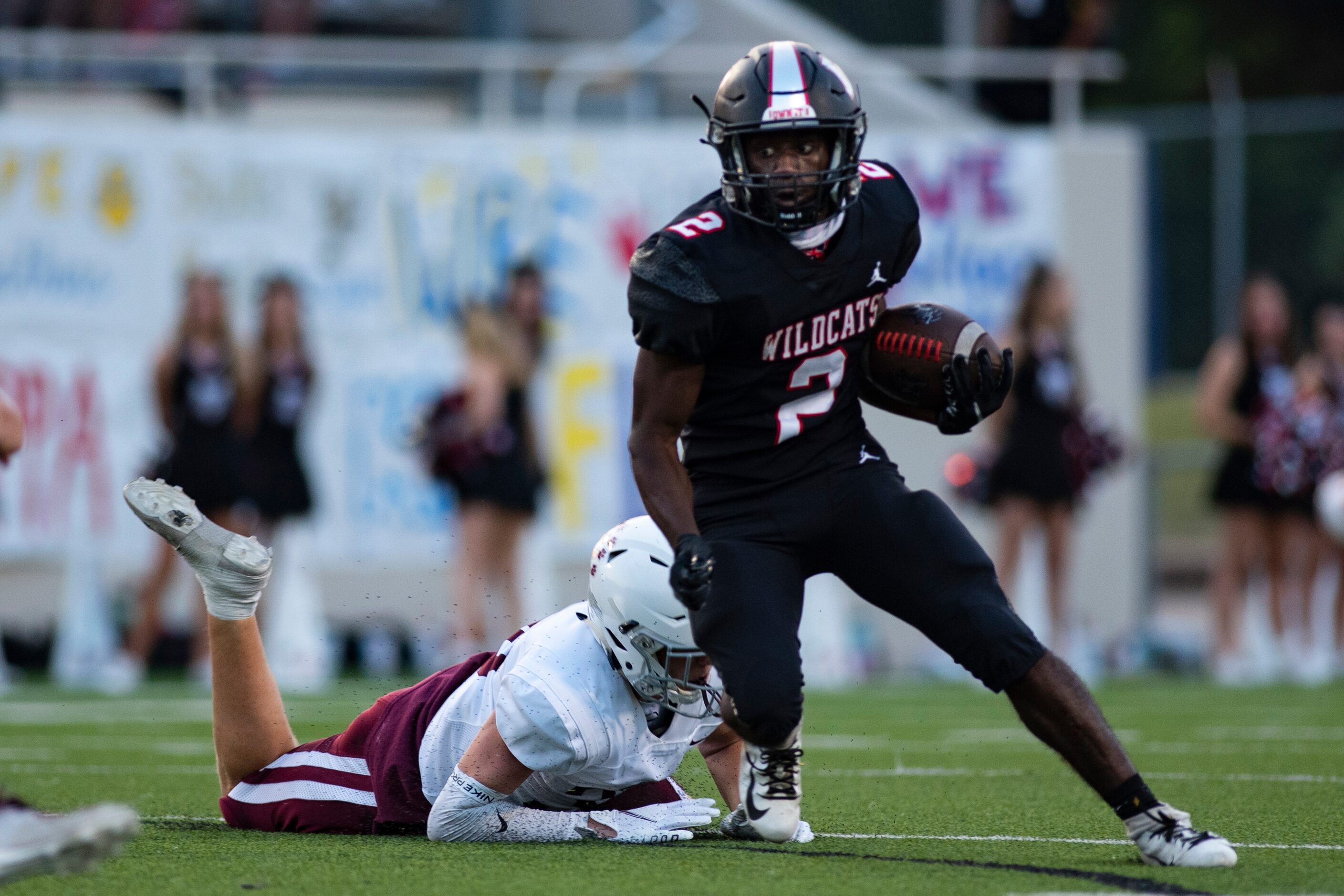 Lake Highlands senior Noelle Whitehead (2) sheds a tackle during Lake HighlandÕs home game...