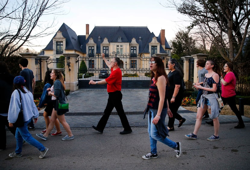 Protesters marched outside the Dallas home of Energy Transfer Partners CEO Kelcy Warren when...