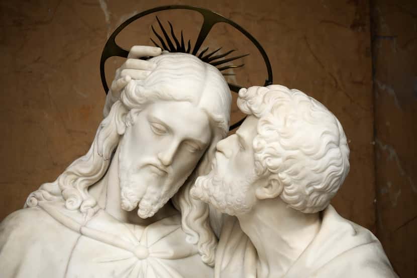 The statue sculpted by Ignazio Jacometti (1854) represents Judas kissing Jesus Christ as a...