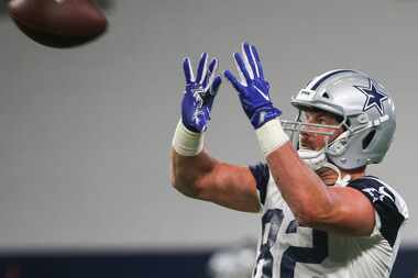 Dallas Cowboys tight end Jason Witten (82) participates in a drill during a Cowboys minicamp...