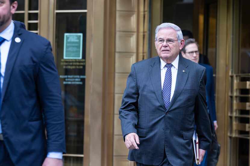 U.S. Sen. Bob Menendez, D-N.J., leaves Manhattan federal court after the second day of jury...