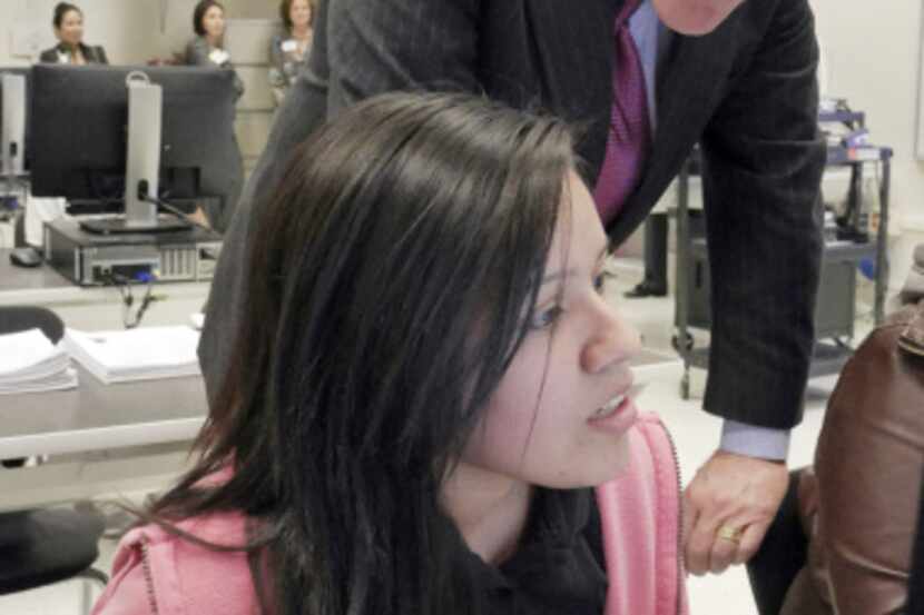 John Cornyn watched Anabell Briceno,15, interact with an online mentor Tuesday at North...