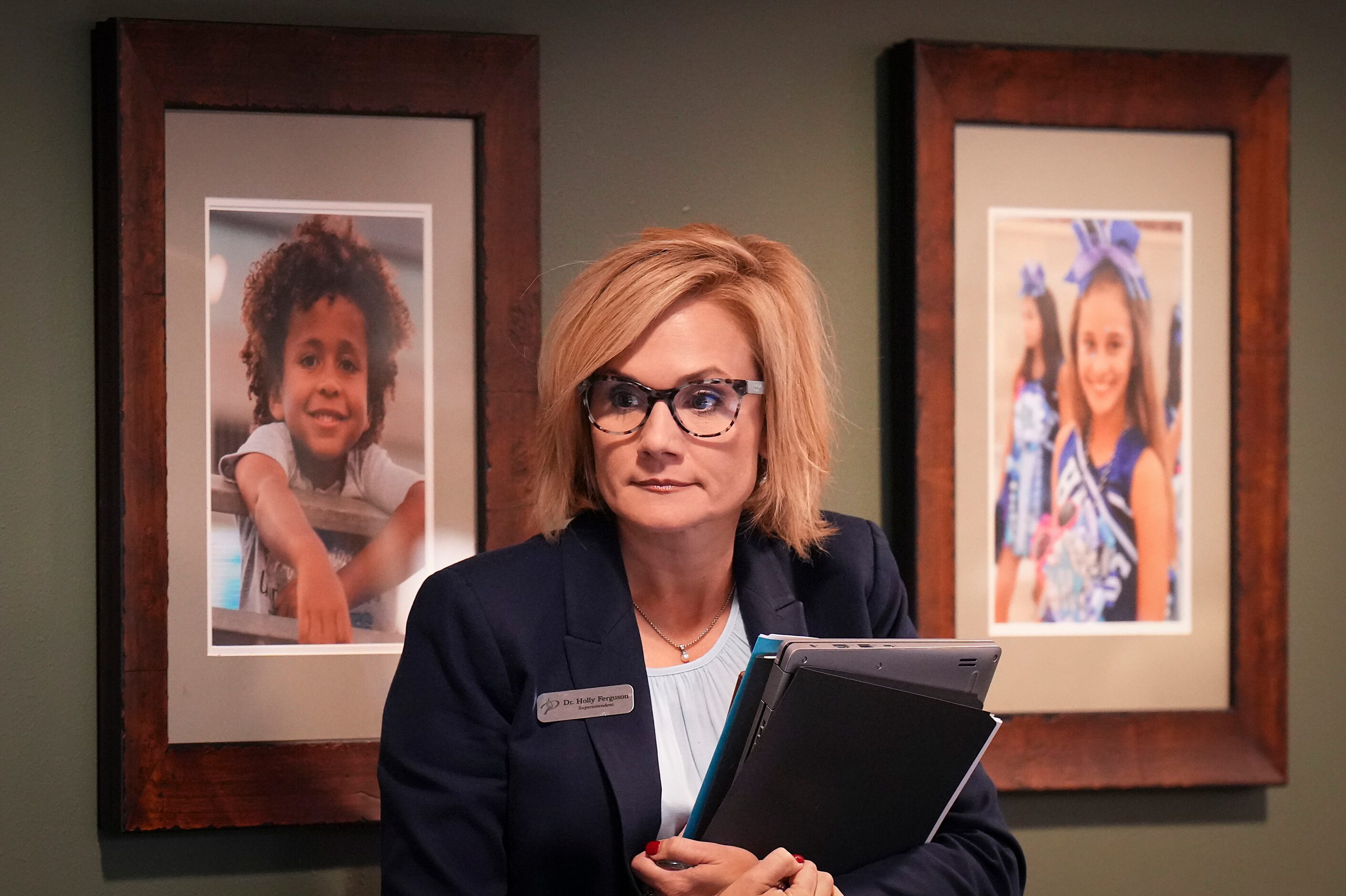 Superintendent Holly Ferguson takes her seat after returning from executive session during a...