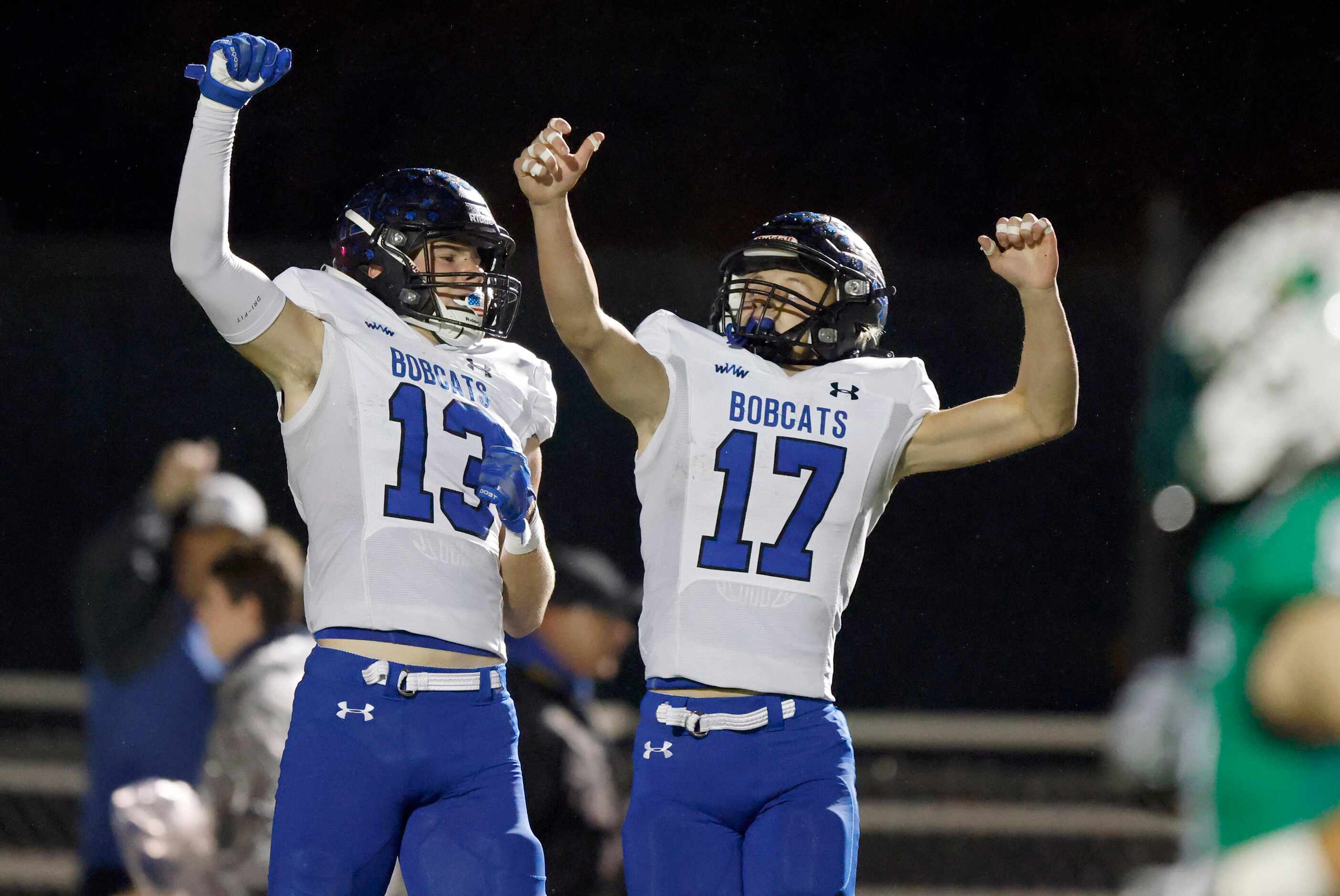 Byron Nelson Landon Farro (17) congratulates Gavin McCurly (13) on his first half touchdown...