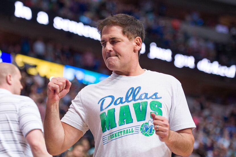 Dallas Mavericks owner Mark Cuban reacts to a call in the second half of NBA Basketball...