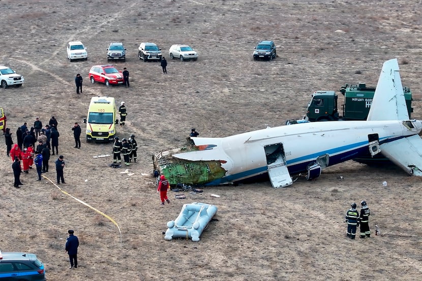 The wreckage of Azerbaijan Airlines Embraer 190 lays on the ground near the airport of...