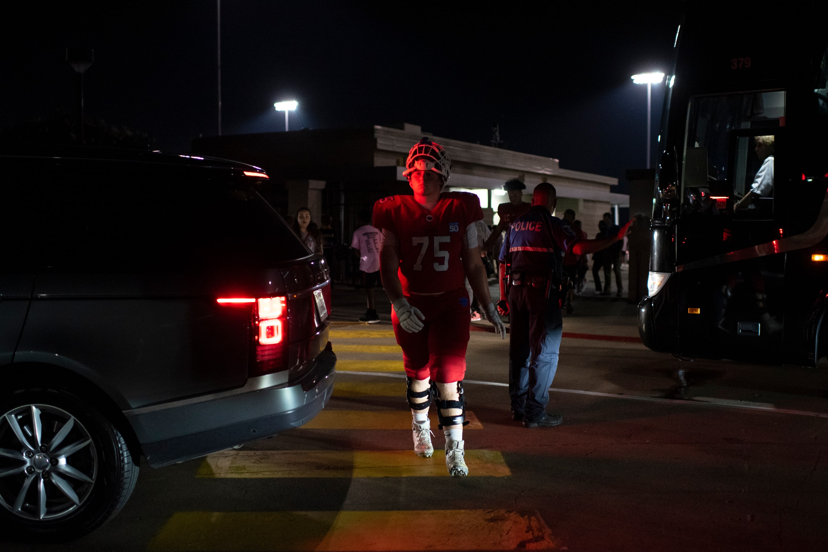 Parish Episcopal sophomore Nate Weber (75) walks back to the locker room after Parish...