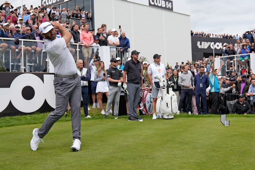 Dustin Johnson of the United States plays from the first tee during the first round of the...