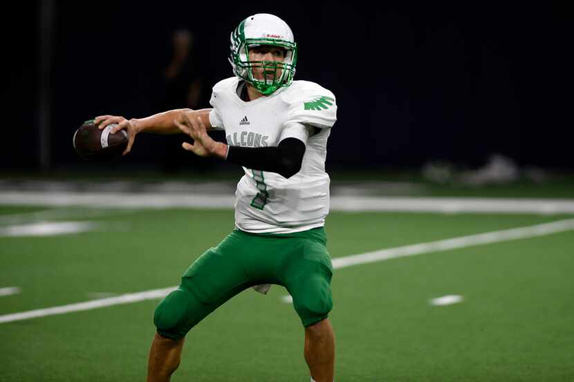 Lake Dallas junior quarterback Ryan Depperschmidt (7) passes the ball to a teammate. Lake...