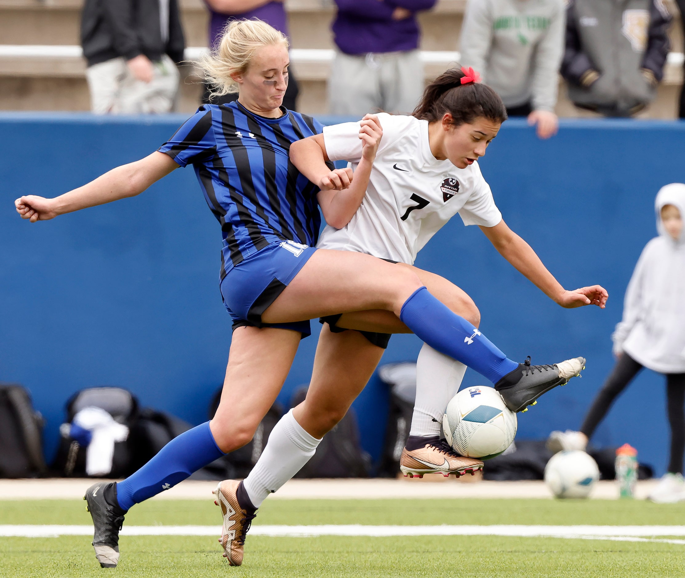 Flower Mound Marcus forward Bella Campos (7) Trophy Club Byron Nelson defenseman Ashlyn Vick...