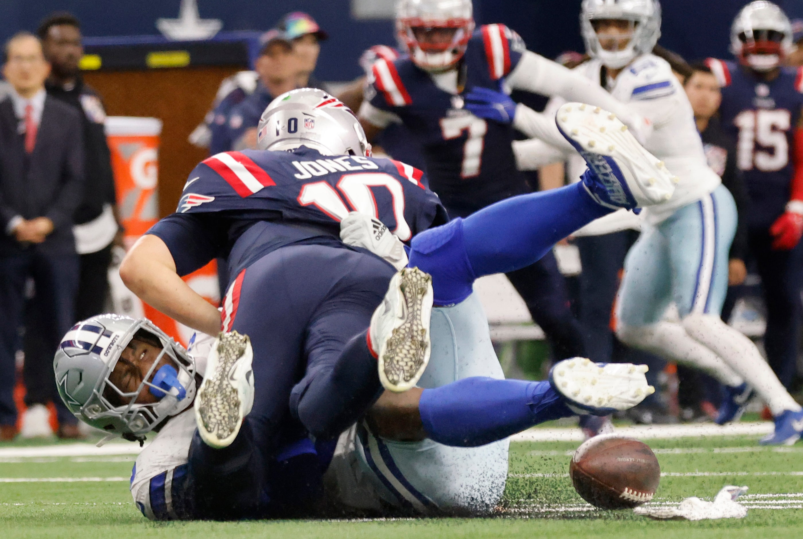 Dallas Cowboys defensive end Dante Fowler Jr. (56) forces New England Patriots quarterback...