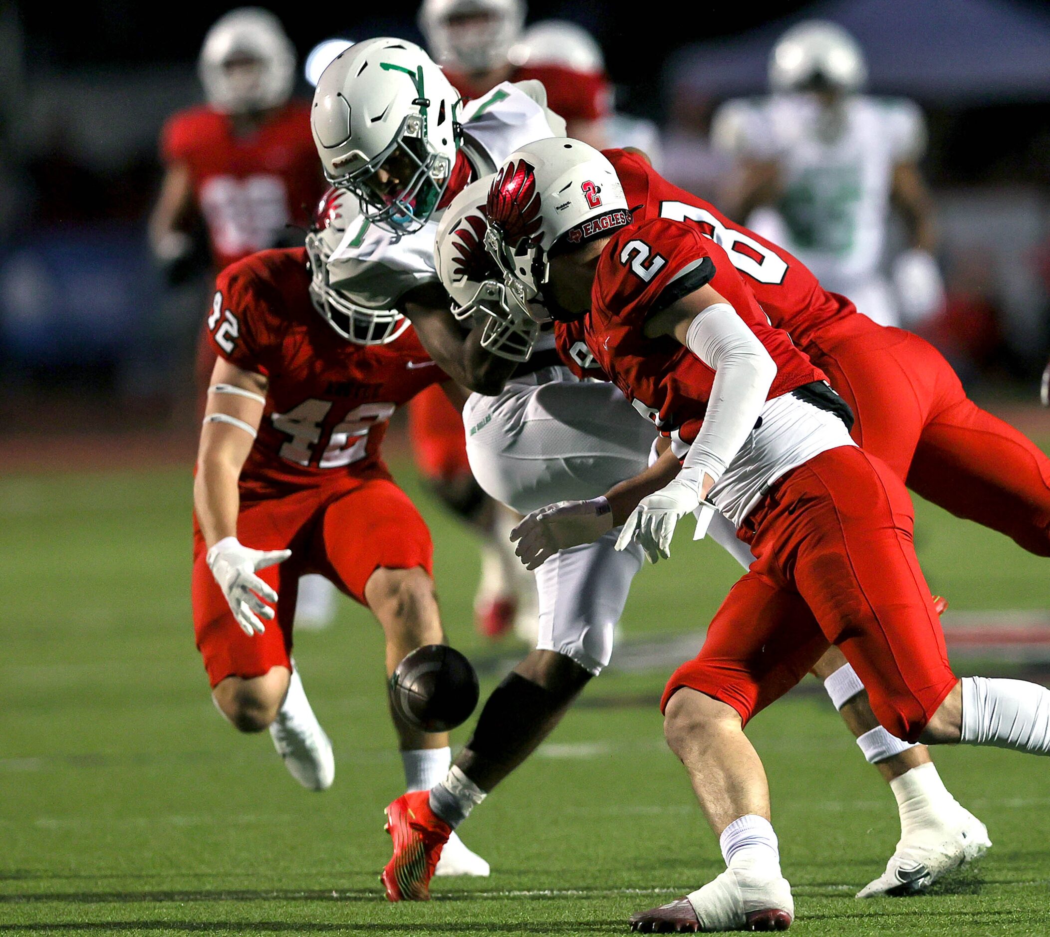 Lake Dallas wide receiver Niki Gray makes a reception then fumbles the ball against Argyle...