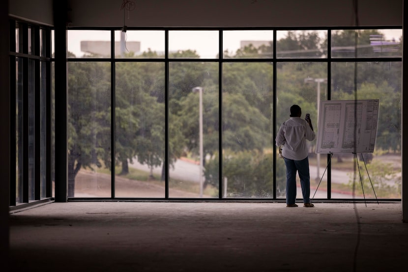 People tour the Dallas Entrepreneur Center’s new 20,000-square-foot innovation center under...