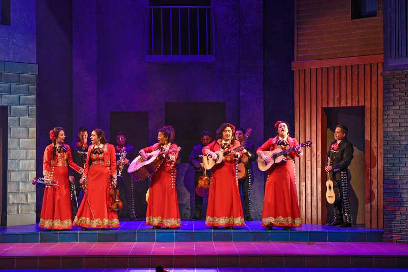 The members of Las Coronelas, an all-female mariachi band, get all dressed up to play their...