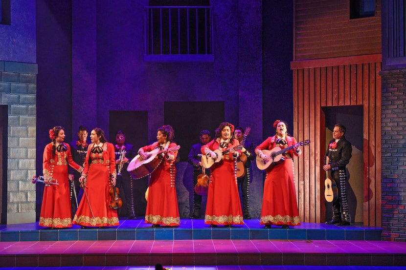 The members of Las Coronelas, an all-female mariachi band, get all dressed up to play their...