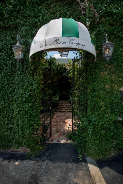 Gate to courtyard of East and Orient Company at 1123 Slocum Street in Dallas, Texas. (Robert...