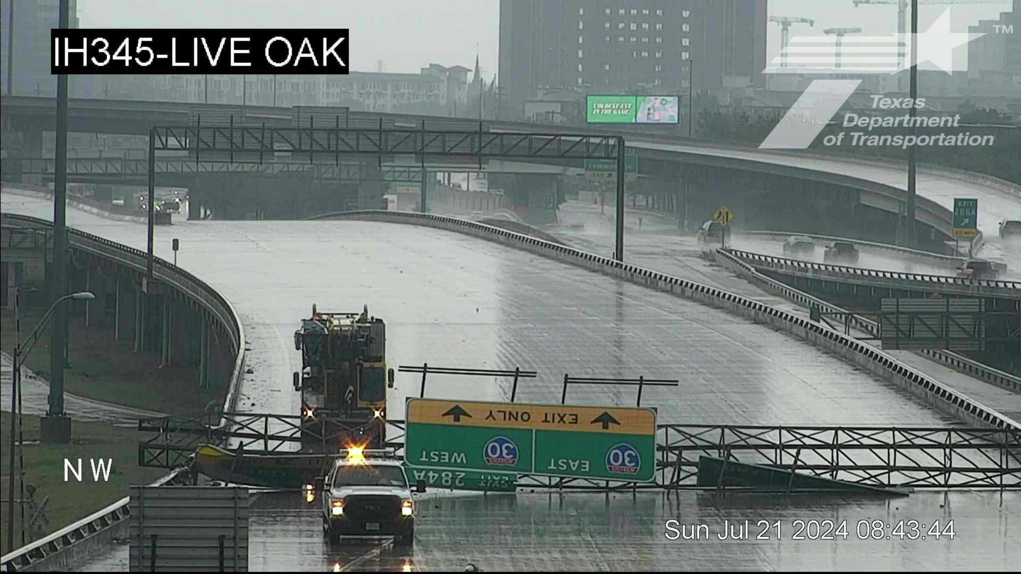 Dallas firefighters injured, DART delays expected after truck falls off  elevated roadway