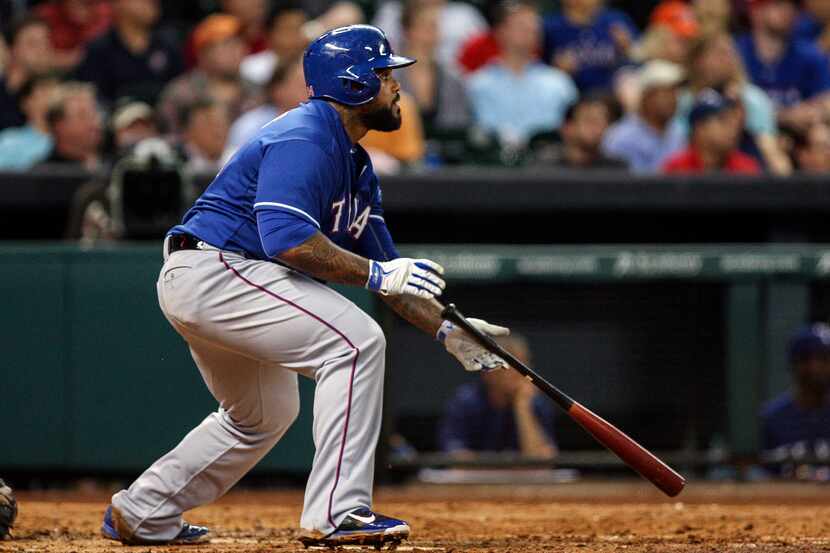 May 12, 2014; Houston, TX, USA; Texas Rangers first baseman Prince Fielder (84) gets a hit...